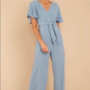 Red dress dusty blue jumpsuit